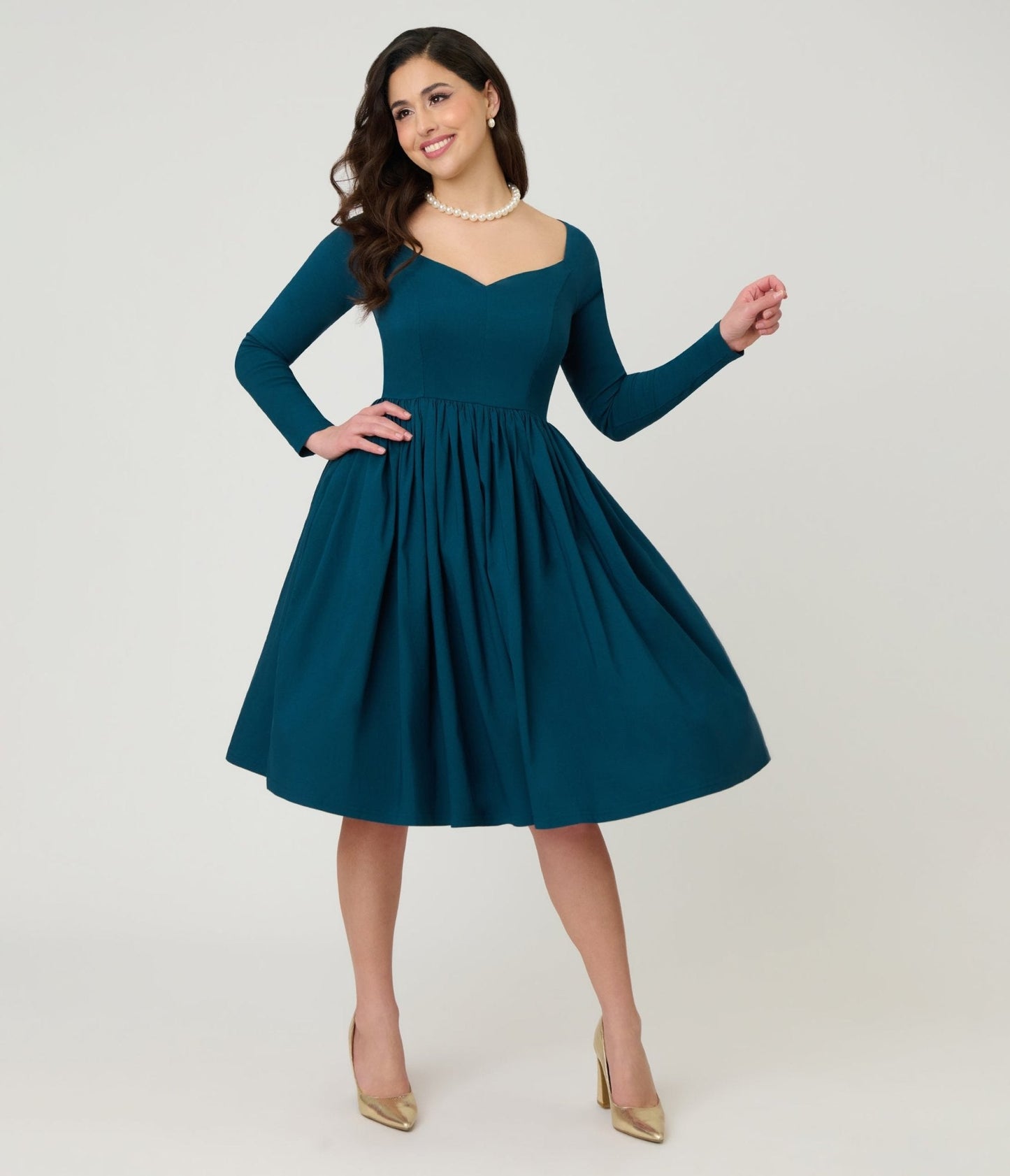 Unique Vintage 1950s Teal Sweetheart Swing Dress
